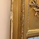 Antique gilded trumeau mirror in Louis XVI style