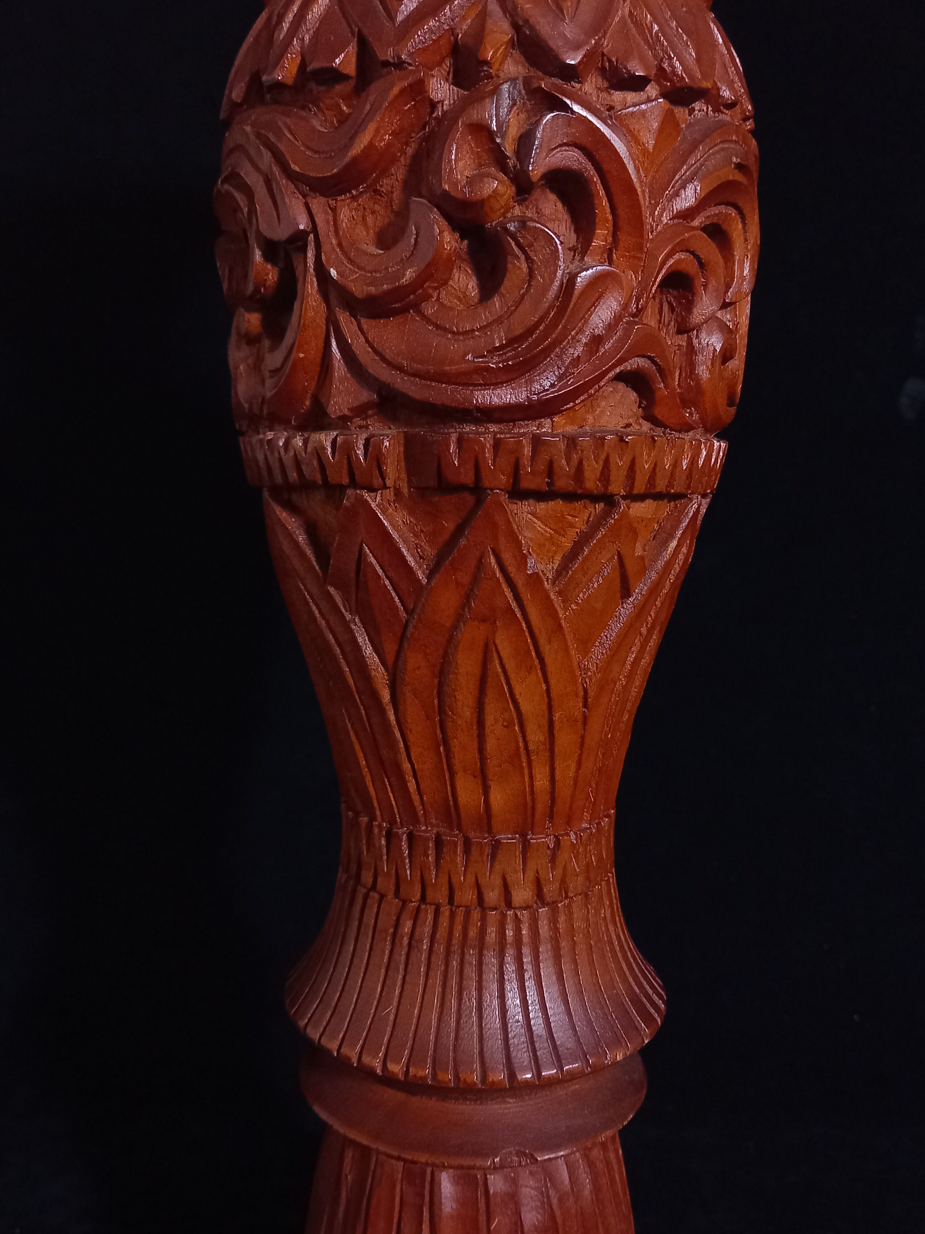 Exotic vase in carved wood