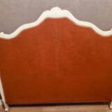 Upholstered bed in rosewood fabric