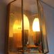 Pair of wall sconces in gold-plated brass with bevelled glass, Italian.