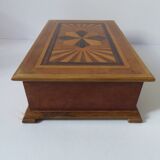 Branded wooden box decorated with suns