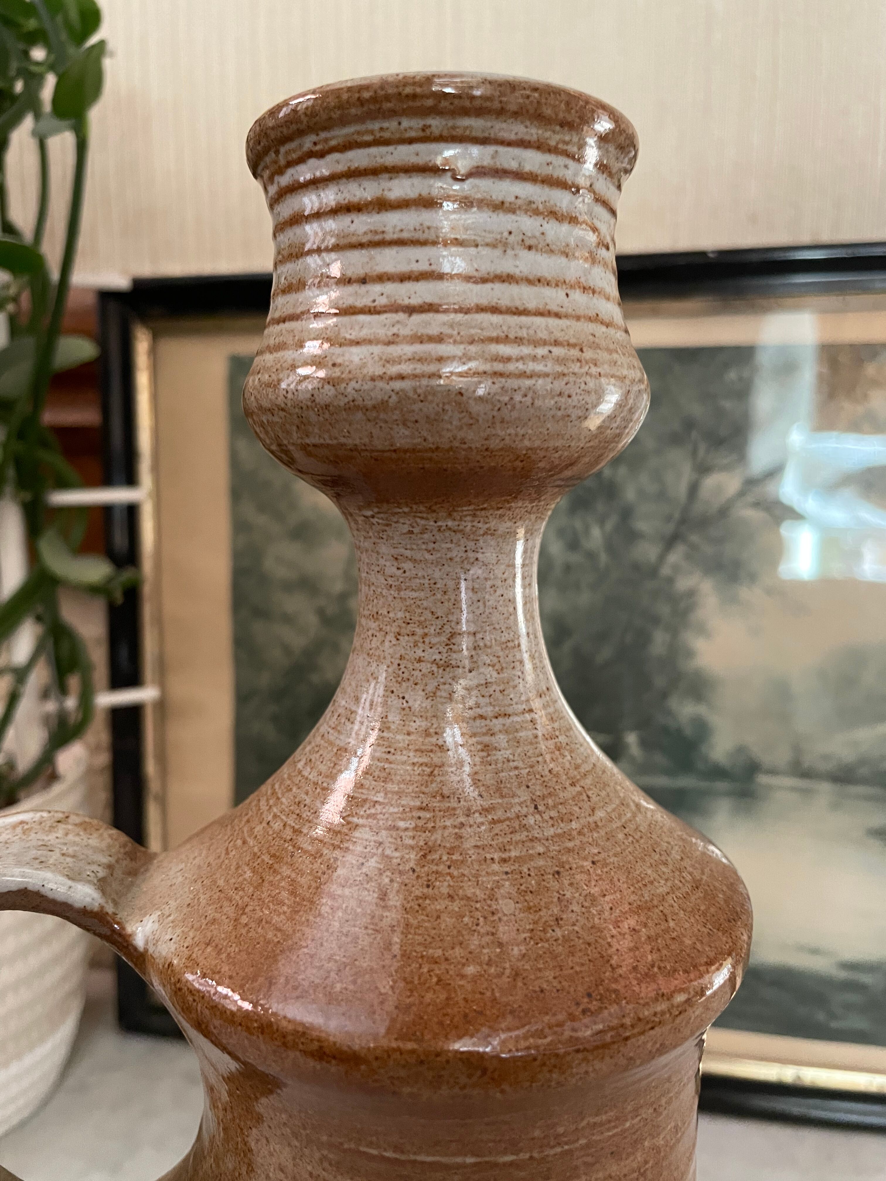 Signed sandstone decanter