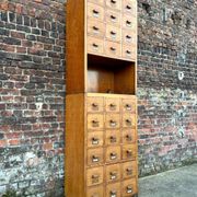 Large vintage workshop furniture with 30 drawers, antique haberdashery compartments.