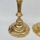 Pair of solid brass candlesticks, early 18th century.