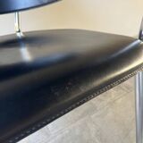 Set of four Italian black leather chairs, 1970