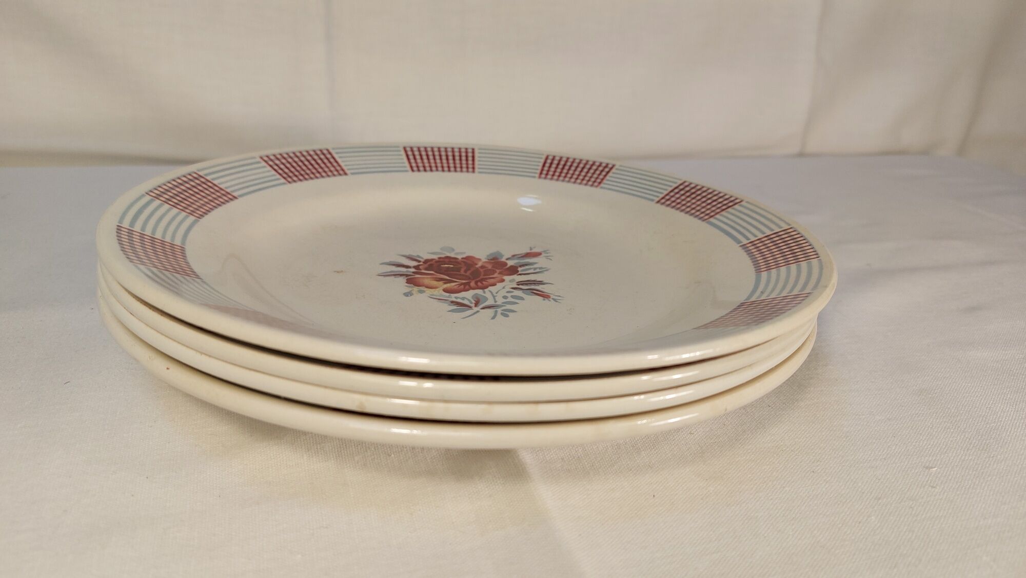 Set of 4 old flat plates from the earthenware factories of St Amand