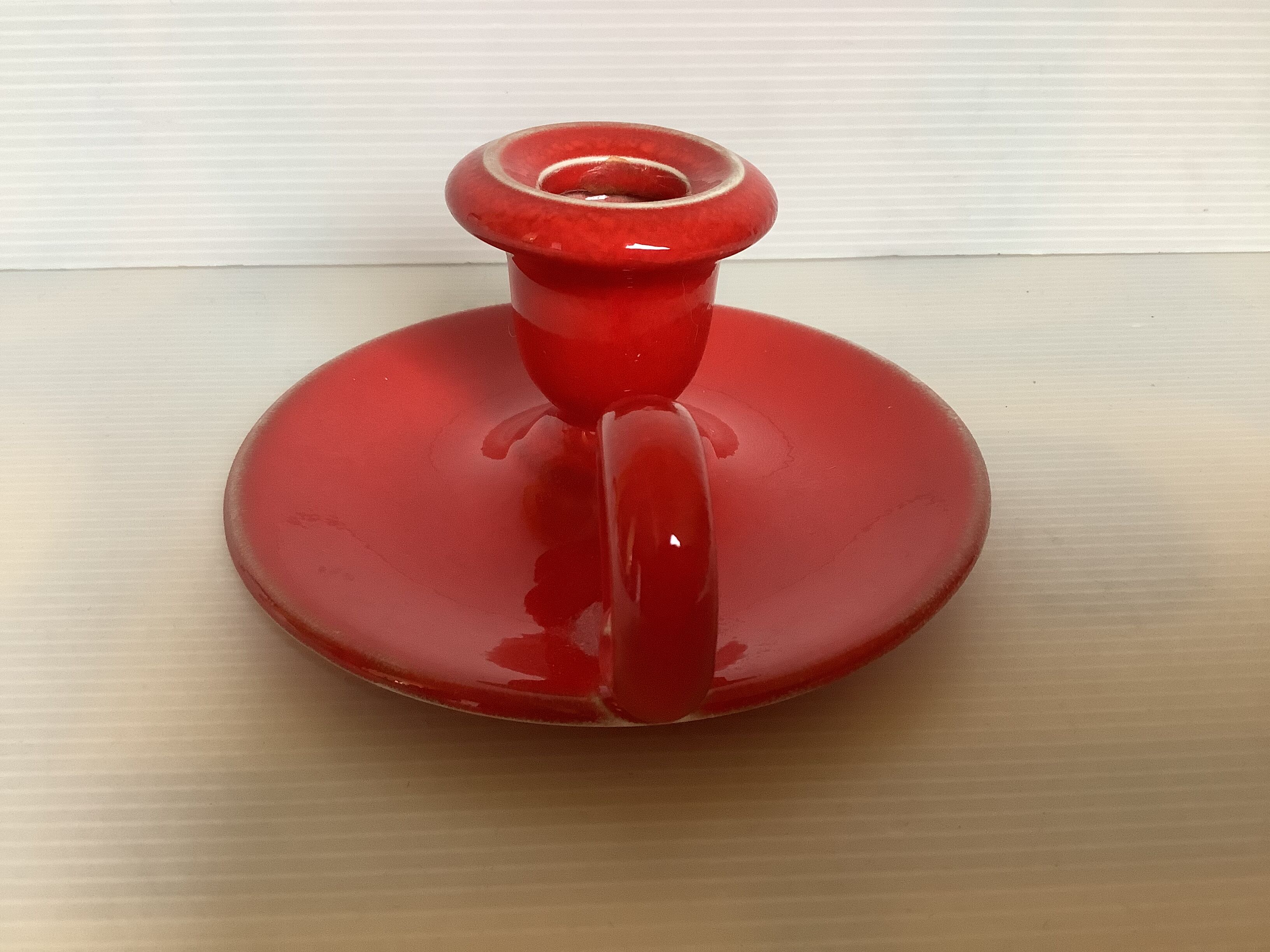 Red ceramic cellar rat candle holder
