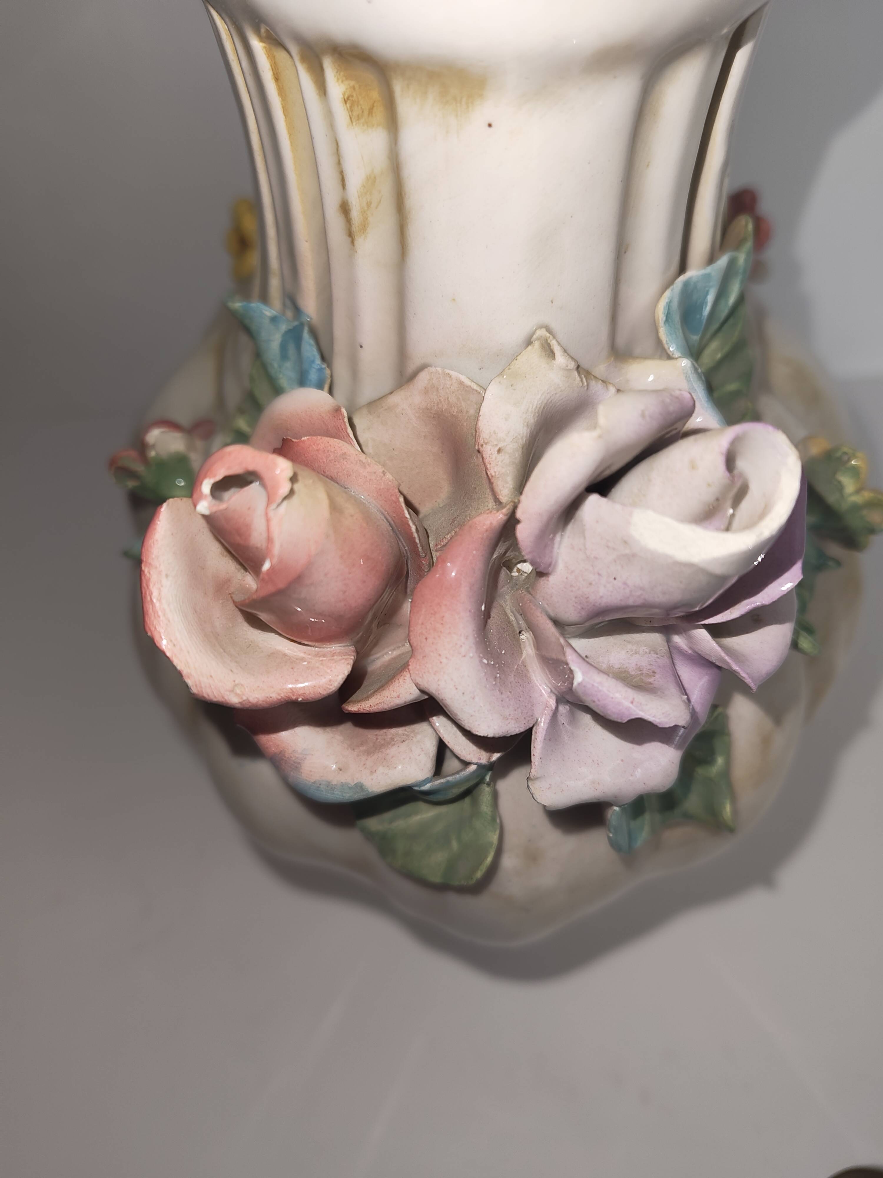Antique ceramic pot-pourri vase with relief floral decoration.
