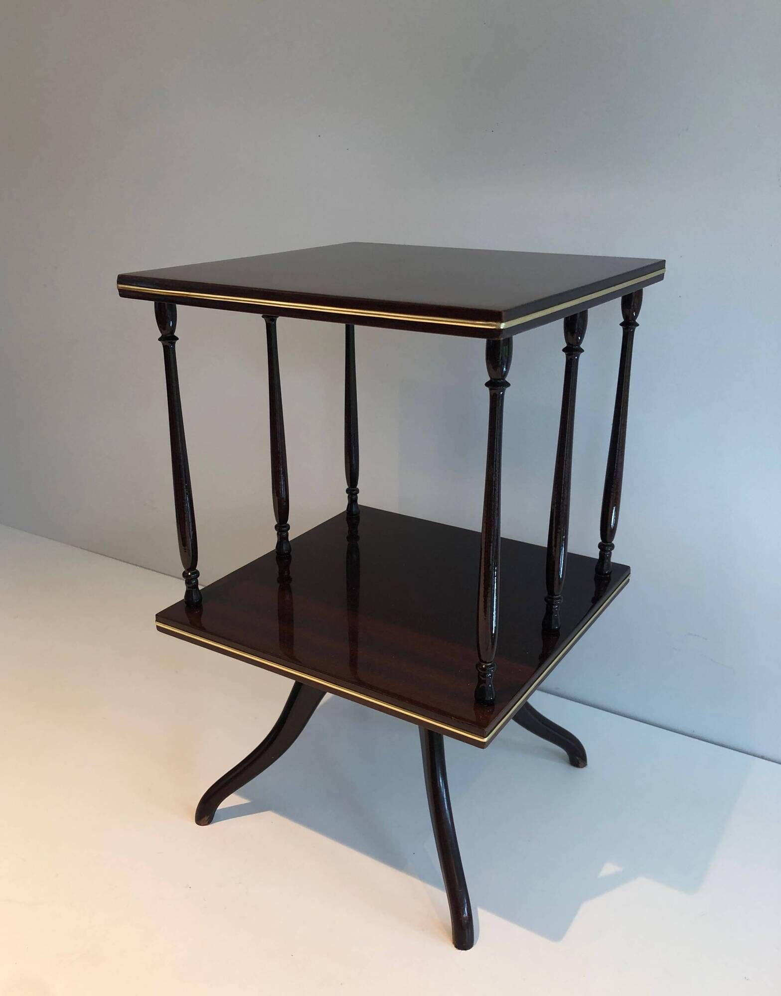 Rotating Table with Two Mahogany and Brass Platforms with Turned Columns.