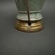 Napoleon III lamp in green cecidon on a brass base