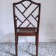 Fauteuil asiatique canné en bois à l'imitation du bambou