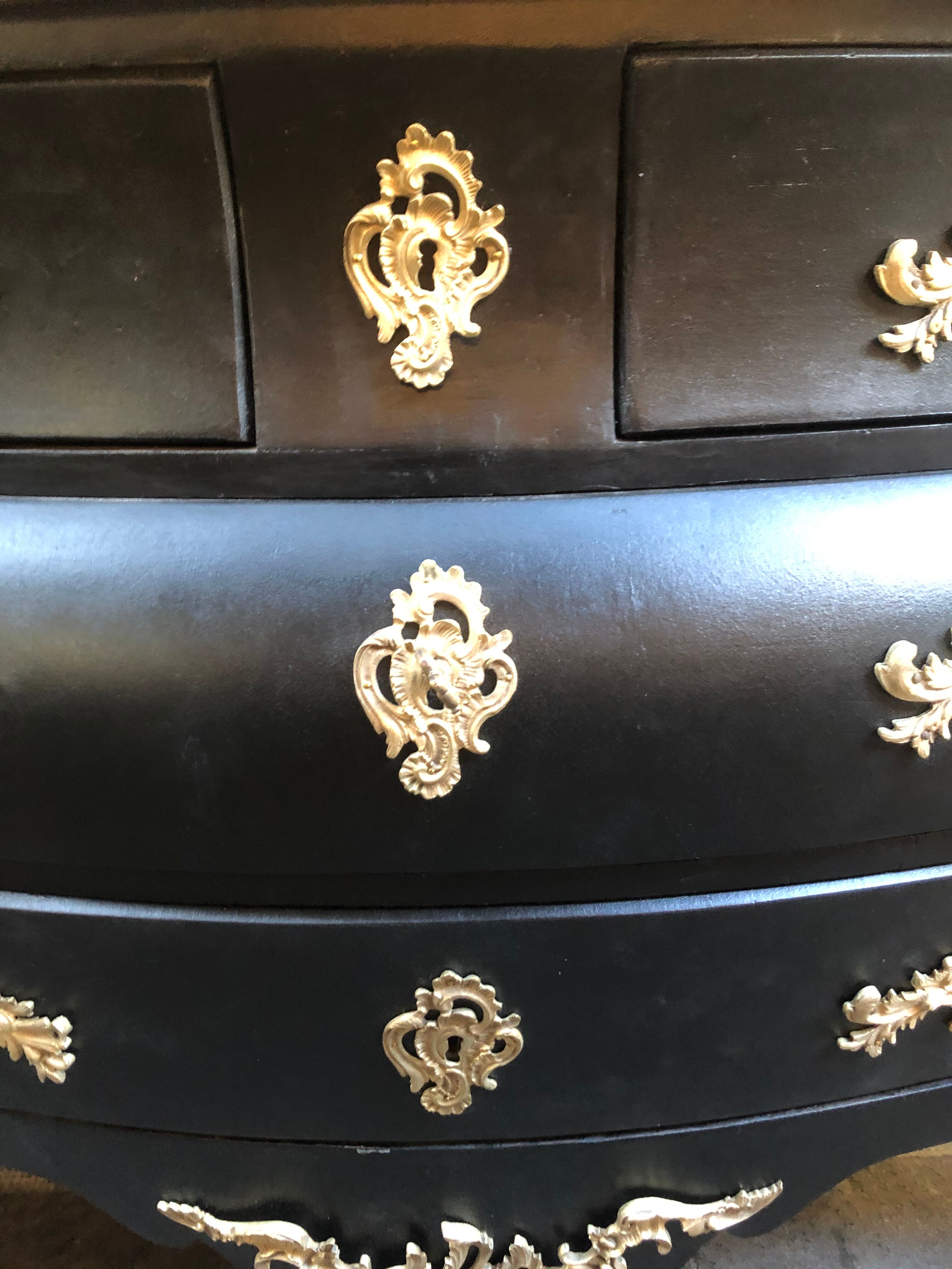 Chest of drawers "tomb" patinated black regency style
