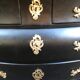 Commode "tombeau" patiné noire style régence