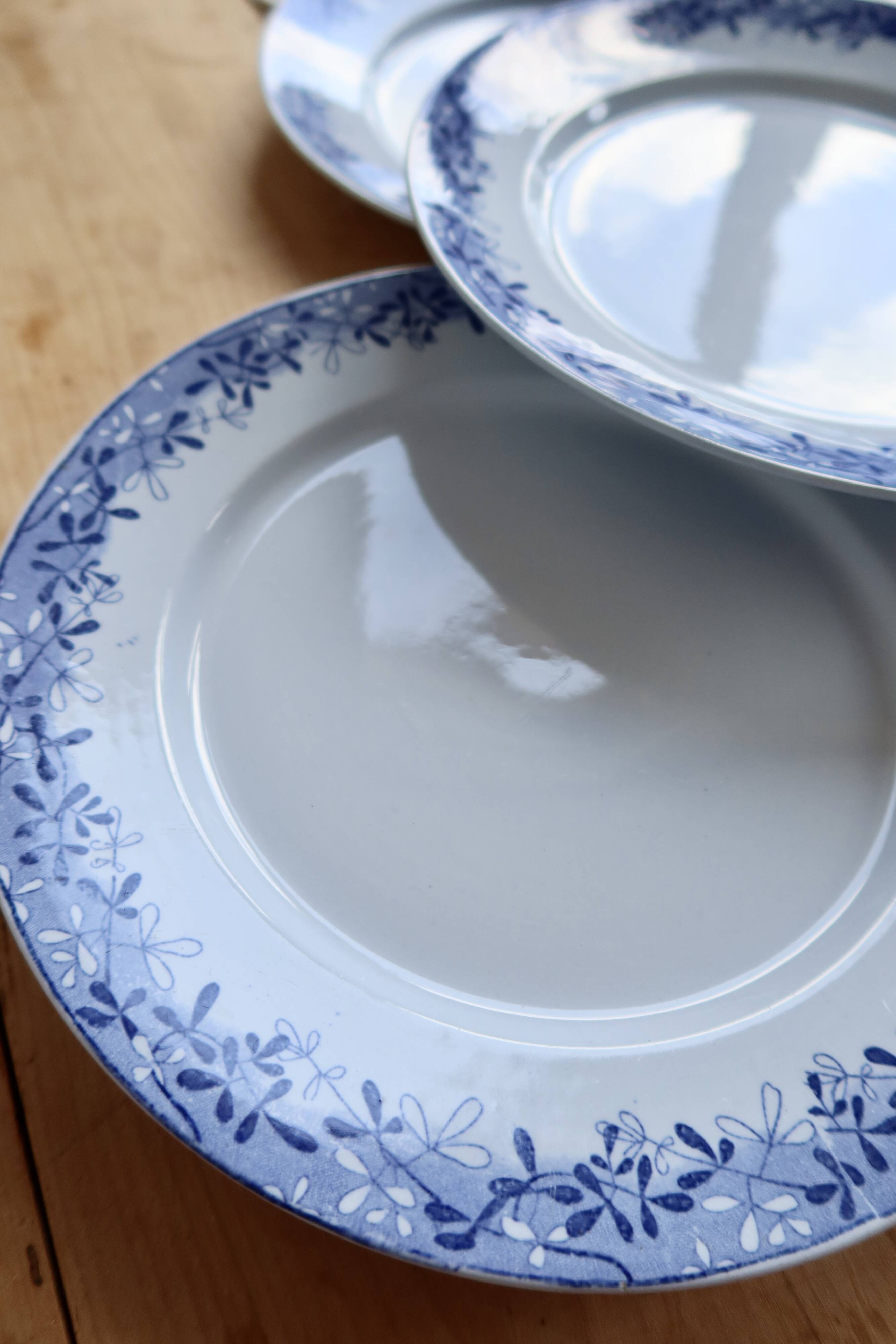 4 antique flat plates from Sarreguemines U&C in the Mimosa blue pattern.