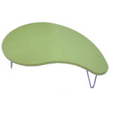 Almond green coffee table in the form of beauty