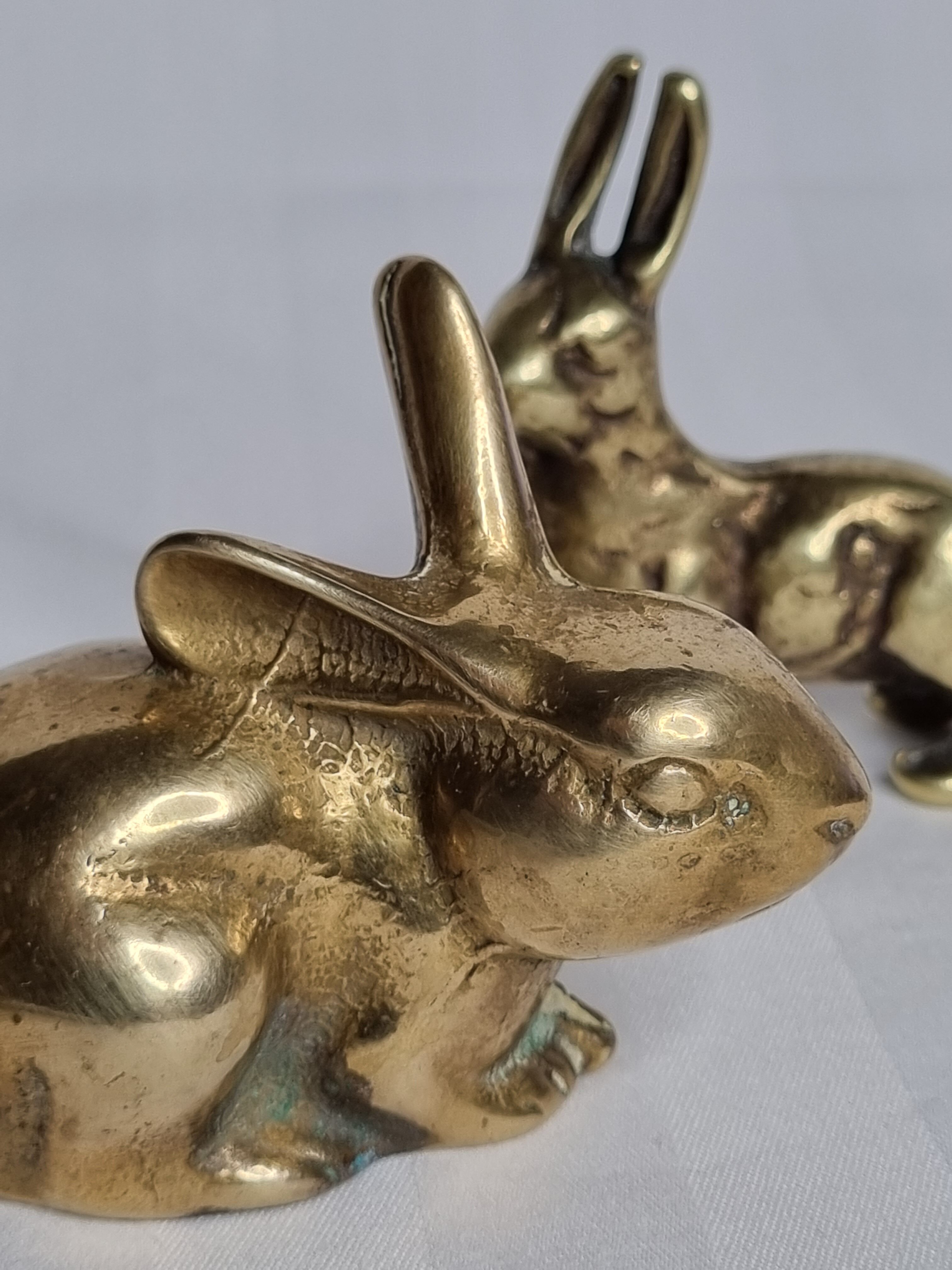 Duo of rabbit and hare in ancient bronze