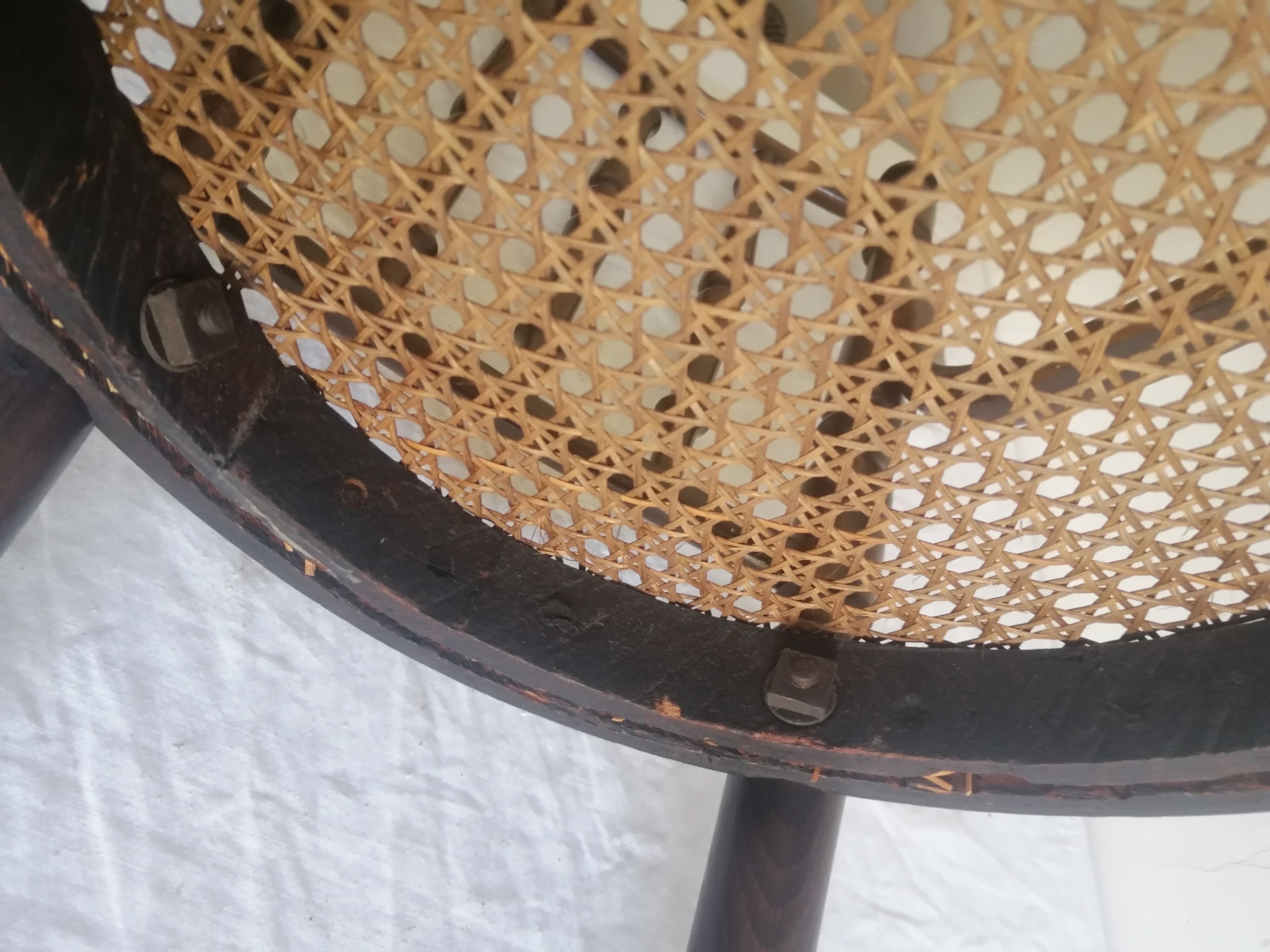 Old children's armchair in curved wood. Fischel