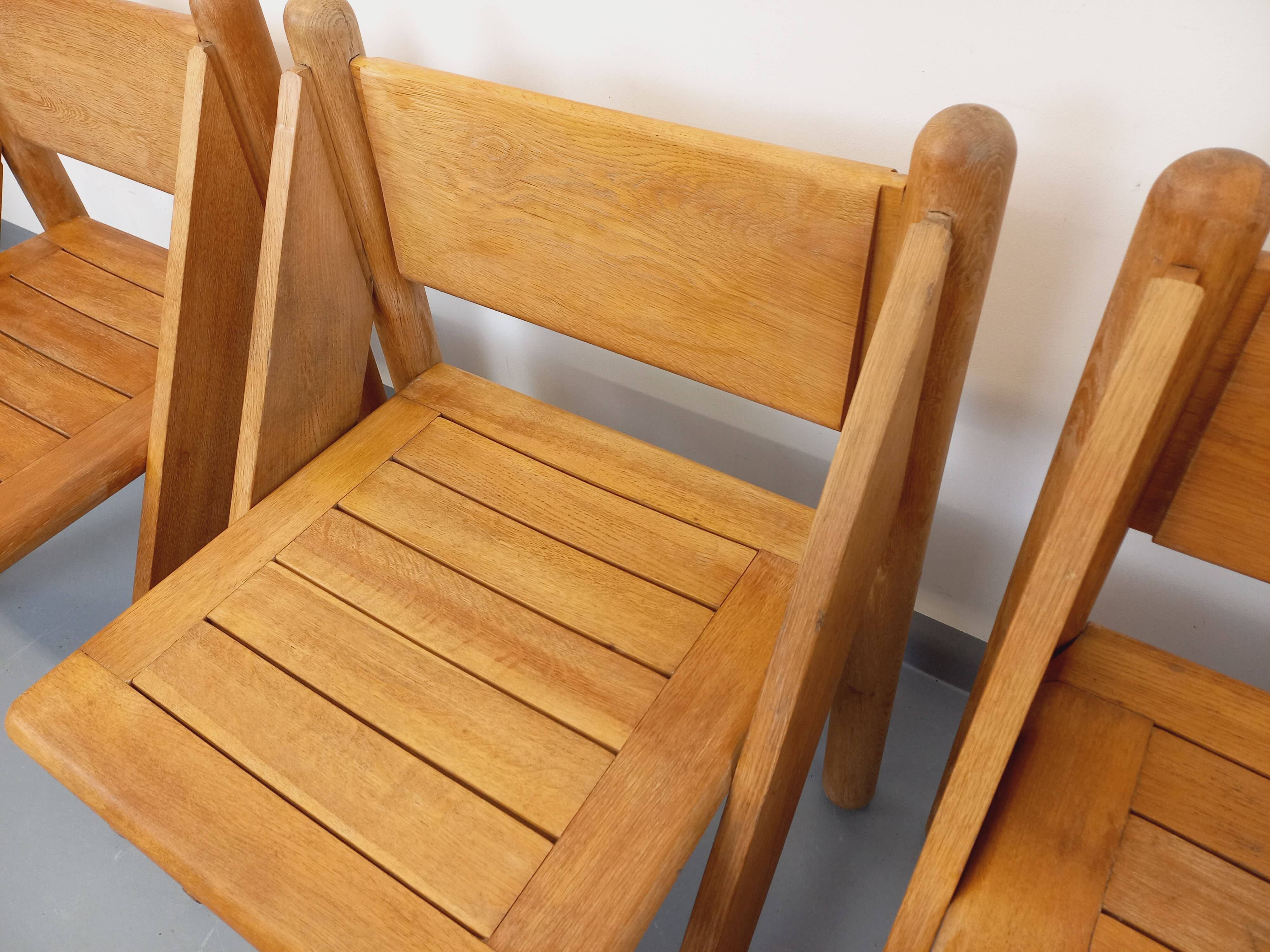 Set of 4 vintage brutalist chairs in solid oak from the 1960s.