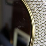 Vintage round mirror in gilded metal