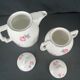 Cafetière et sucrier art déco en porcelaine vers 1930