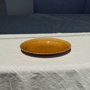 Antique oval dish, yellow-orange, frieze border L:24