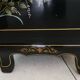 Buffet of black and gold laqué Chinese storage with relief subjects decorated flowers painted birds