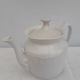 White earthenware teapot