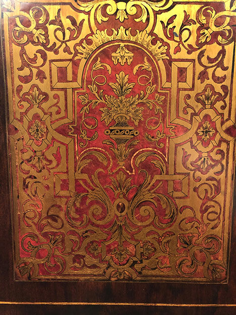 Varnished wood showcase and gold decoration in imitation of the so-called Boulle marquetry