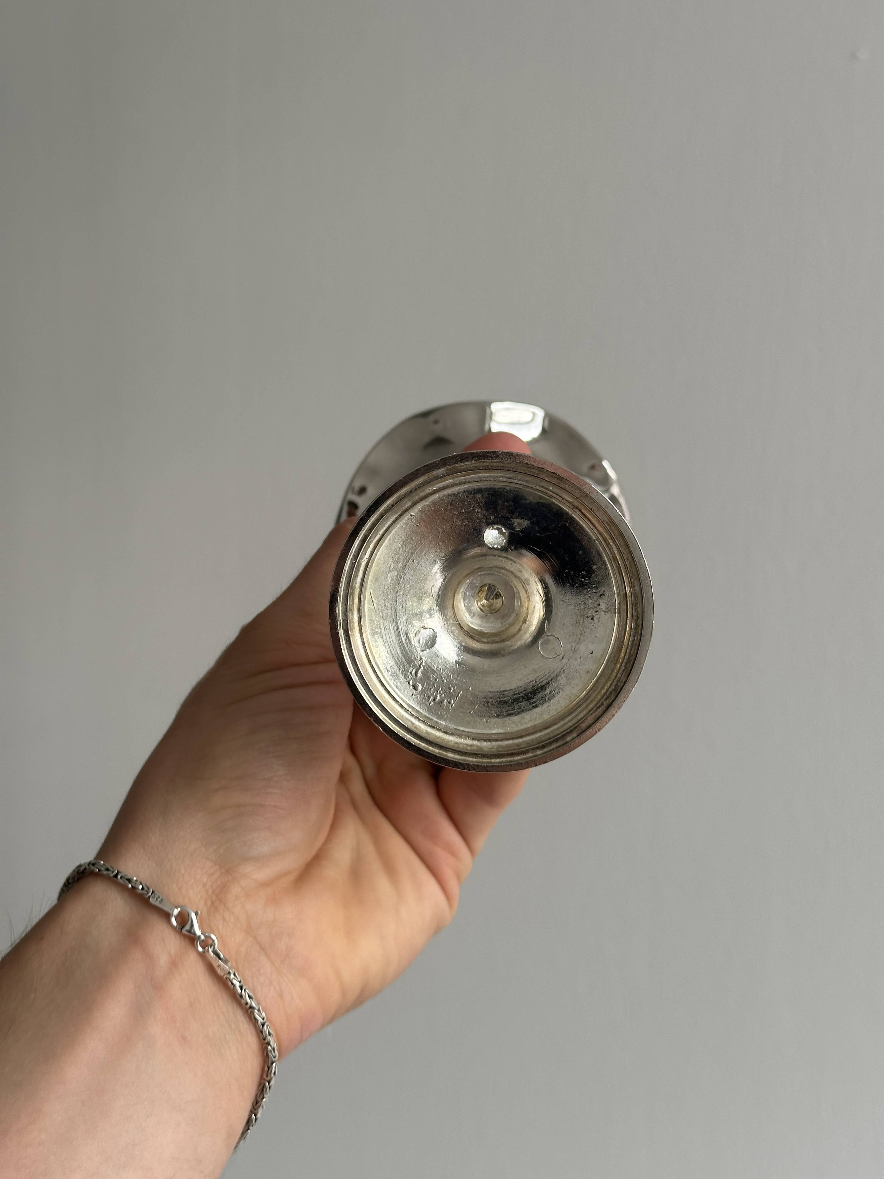 Small silver metal vase