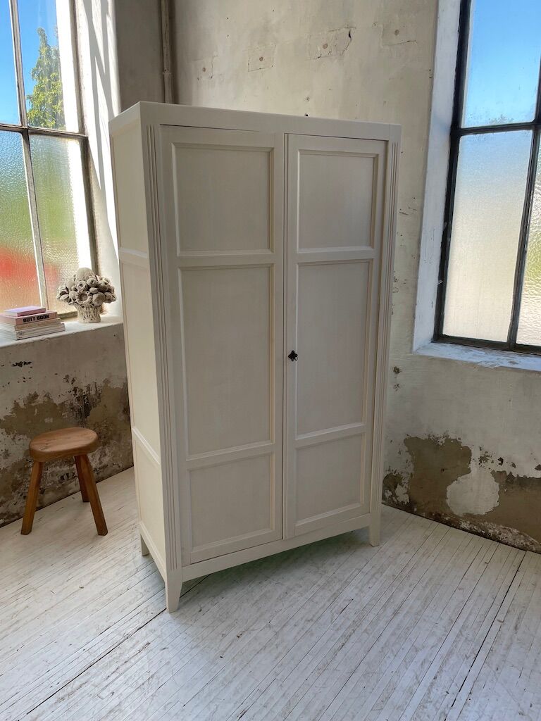 White and green cutter cabinet