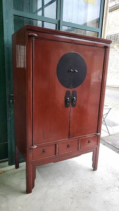 Small Asian lacquered wardrobe with 2 doors and 5 drawers.