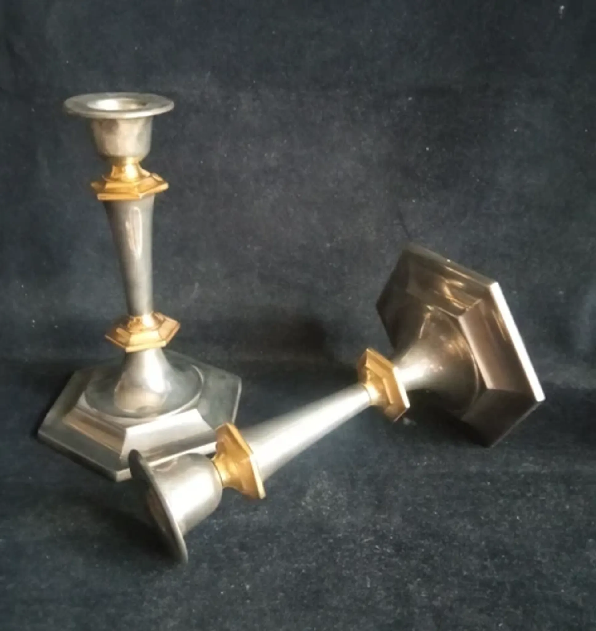 Pair of small English candlesticks in silver-plated metal and brass - 20th century.