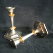 Pair of small English candlesticks in silver-plated metal and brass - 20th century.