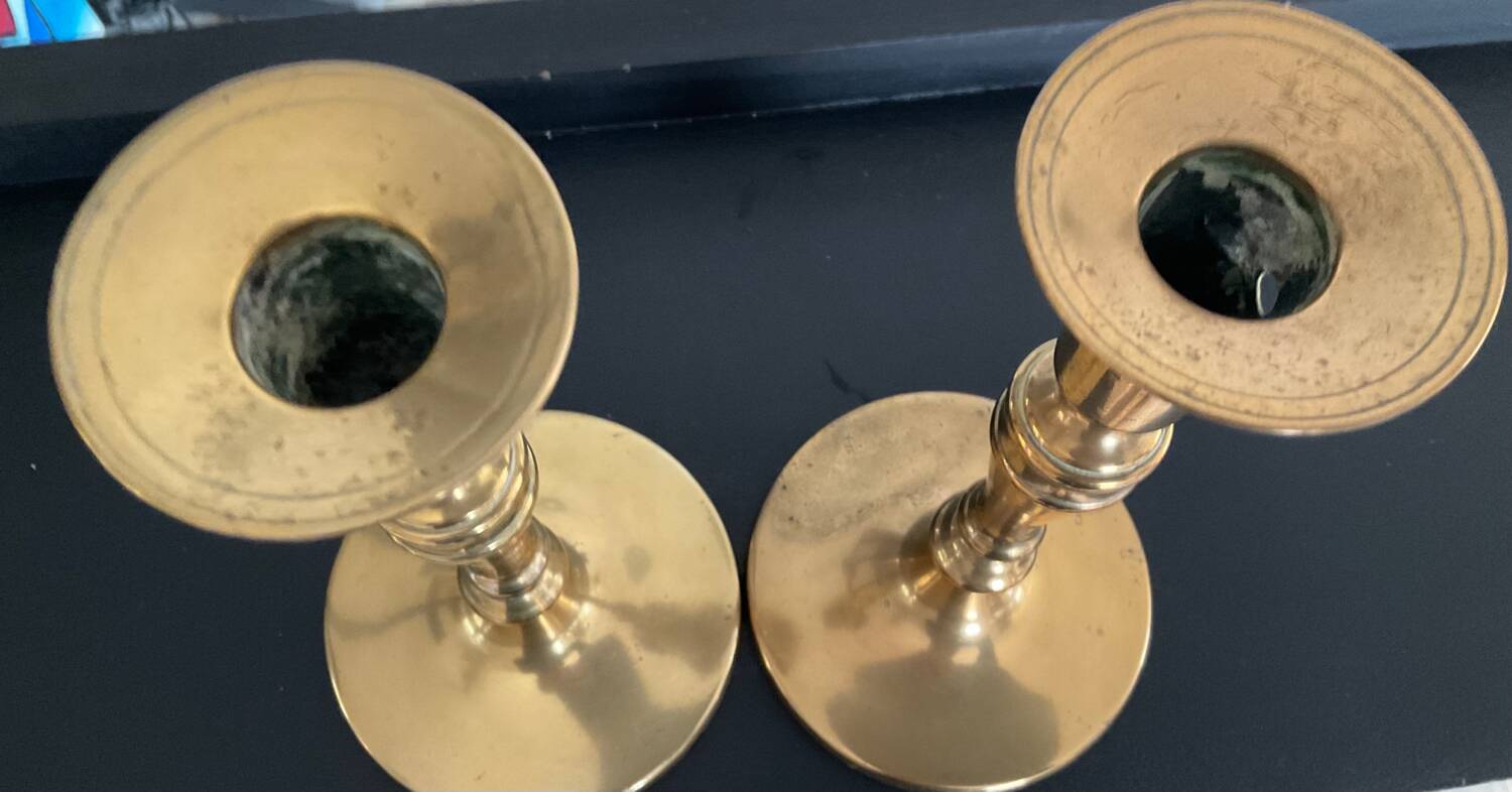 Pair of old bronze candlesticks