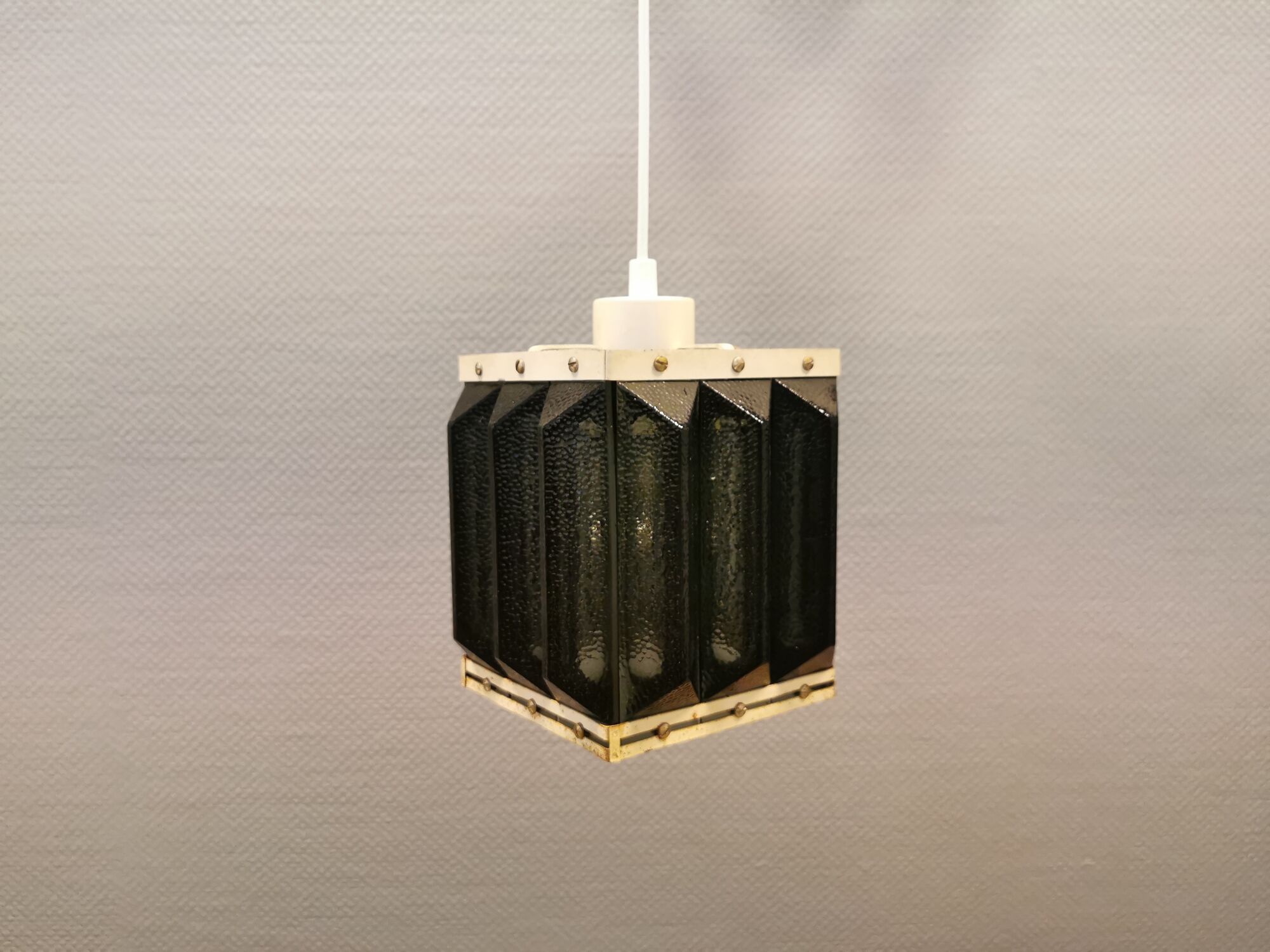 Old Swedish lamp made of metal and smoked solid glass pieces.