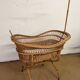 Rattan cradle on wheels