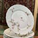 Service de table en porcelaine de Limoges à décor floral des années 1950 - 31 pièces