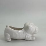 Ceramic flower pot in the shape of a dog