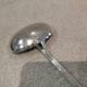 Silver-plated sauce spoon by Christofle silversmiths, Louis XVI ribbons