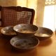 Four bowl-shaped plates in vintage Niderviller stoneware with plant decoration