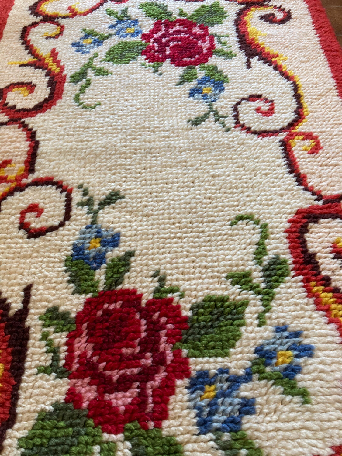 Vintage wool rug with floral decor