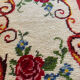 Vintage wool rug with floral decor