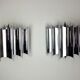 Pair of Raak wall lamps, space-age chrome design, Germany, 1970