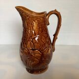 Brown pitcher with rose motifs
