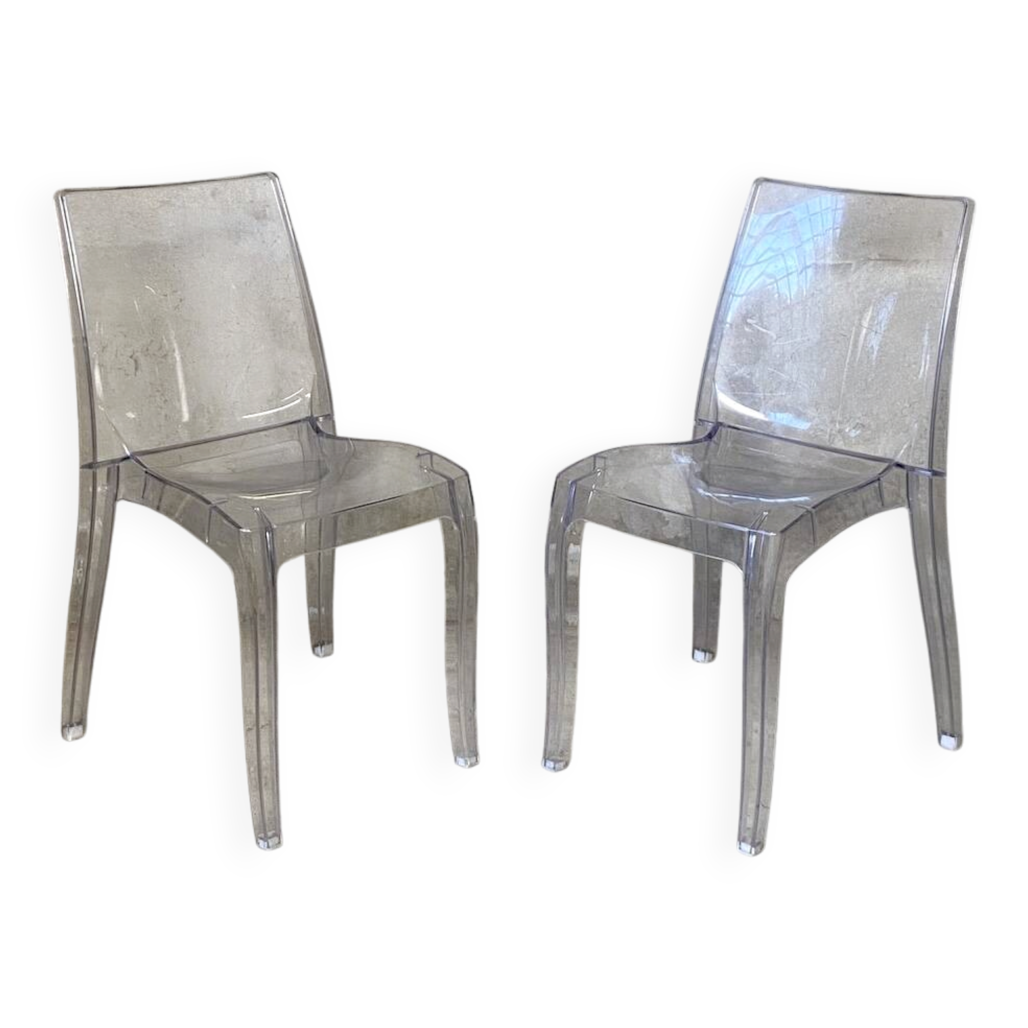 Pair of transparent polycarbonate chairs