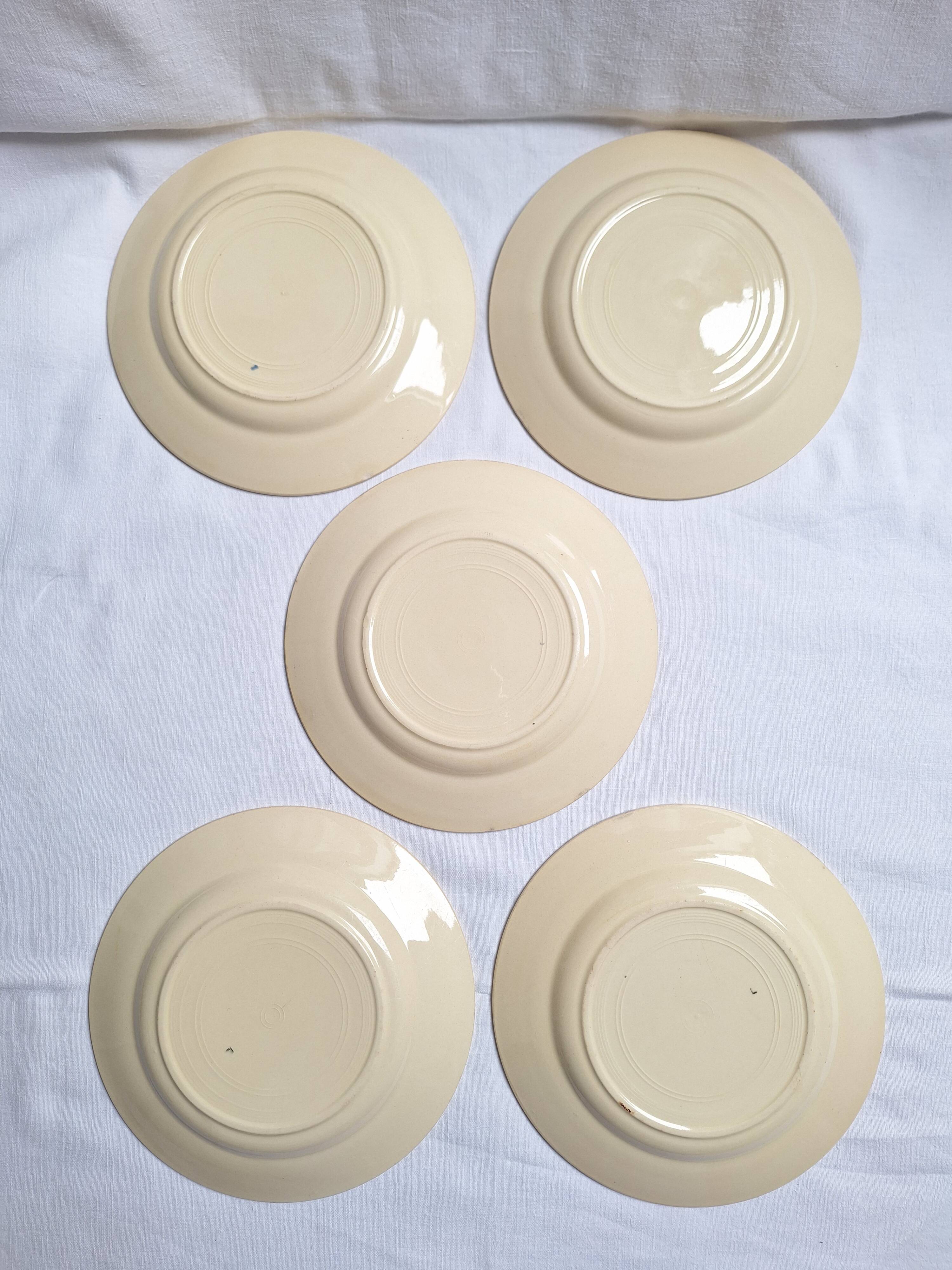 Vintage cream, orange and blue dinner plates.