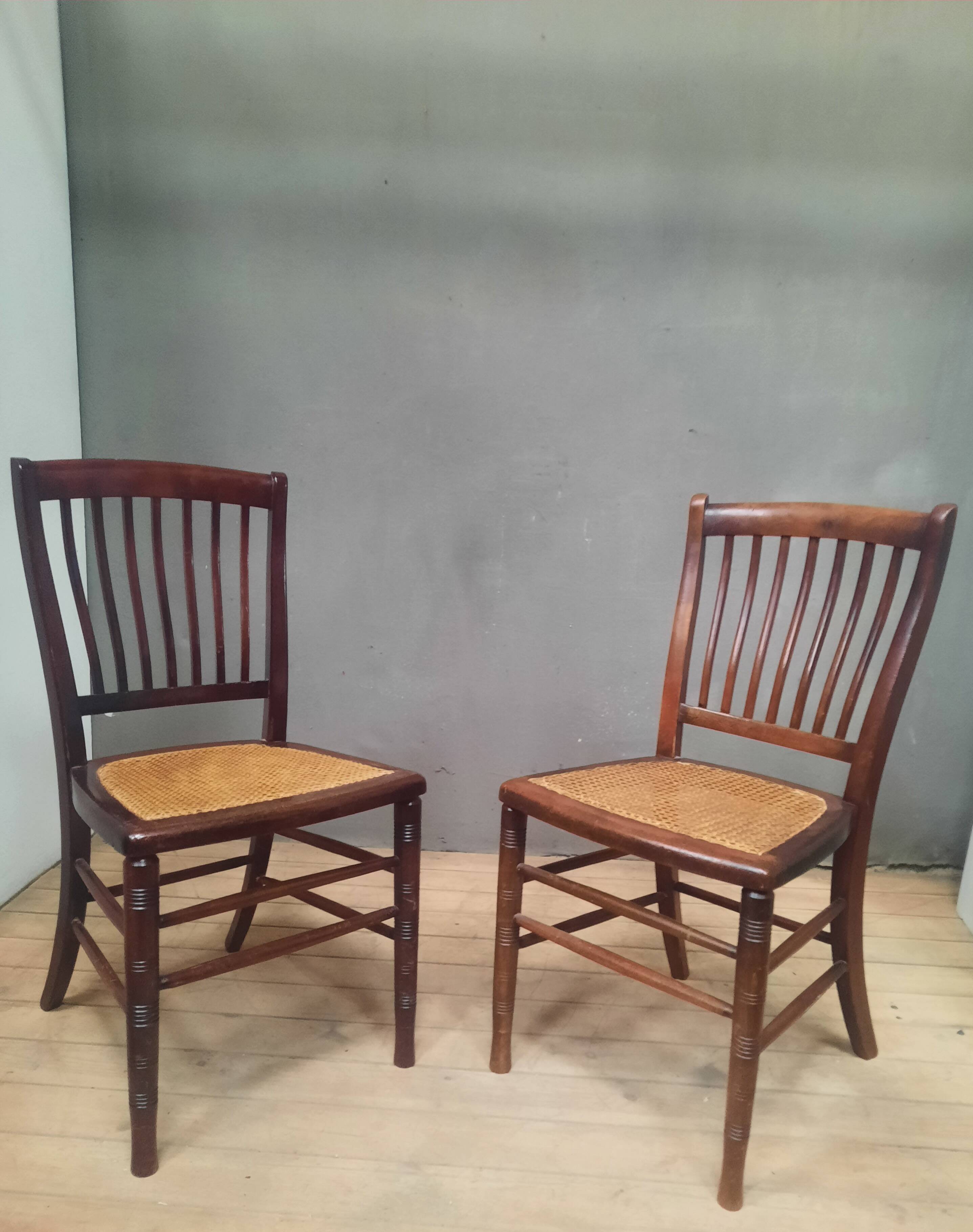 Pair of "1900" caned chairs