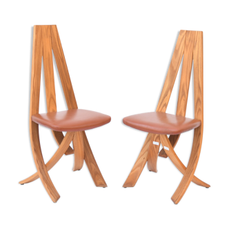 Pair of curved wooden chairs