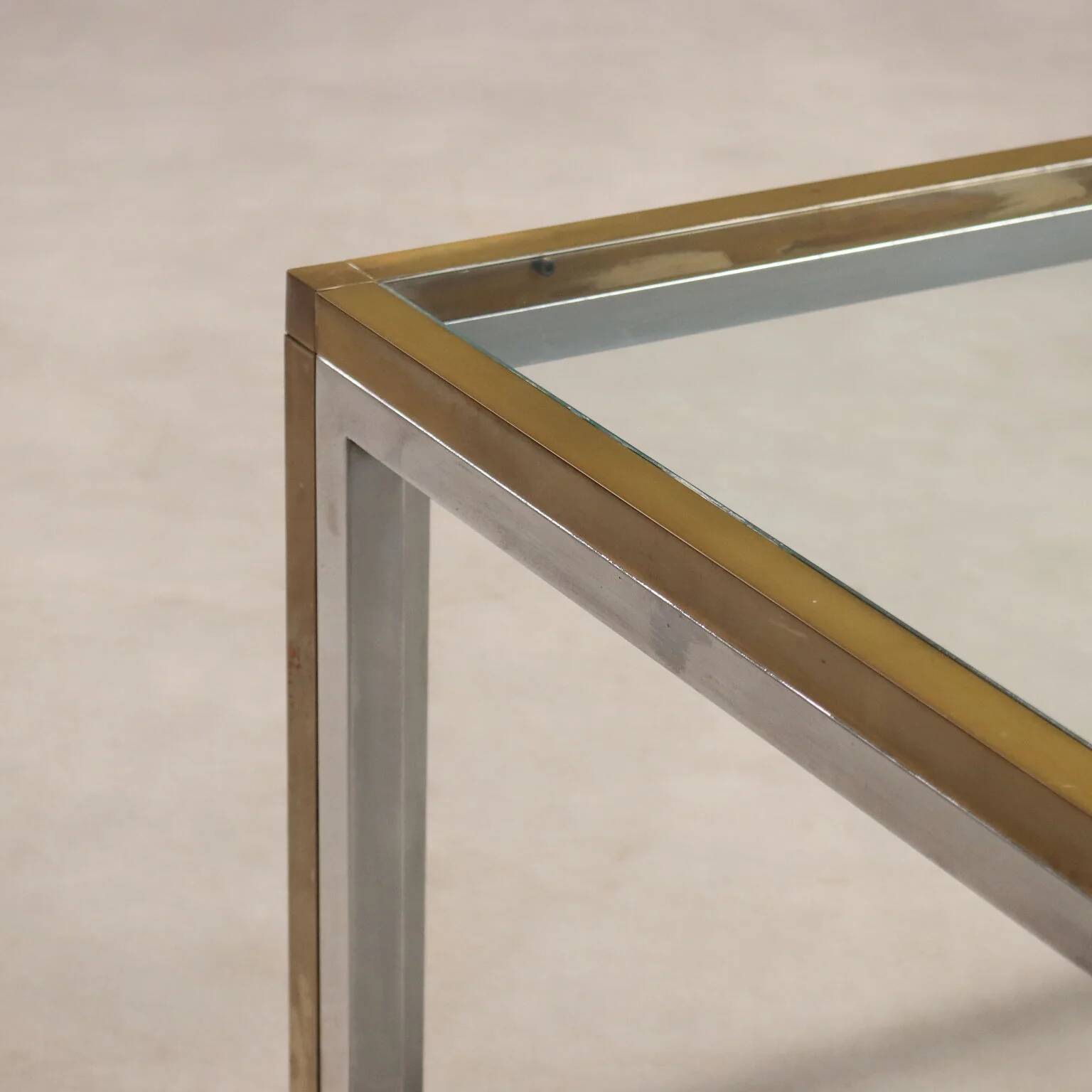 Vintage coffee table in metal, brass and glass, 1970s design.