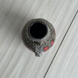 Small textured ceramic pitcher or vase